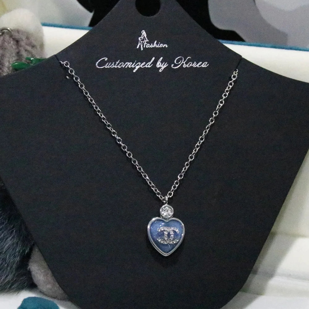 Chanel Blue Heart Necklace & Earrings