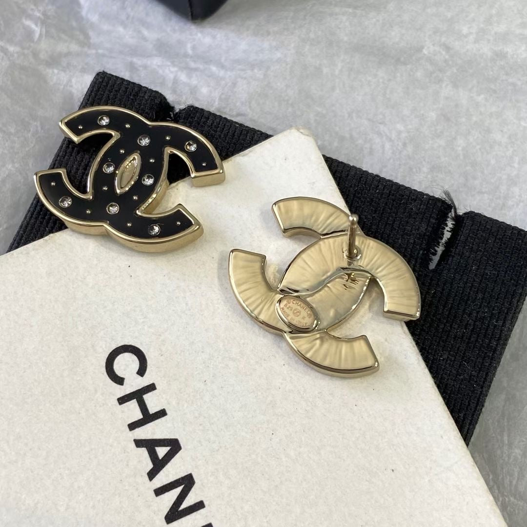 Chanel Black Star Earrings