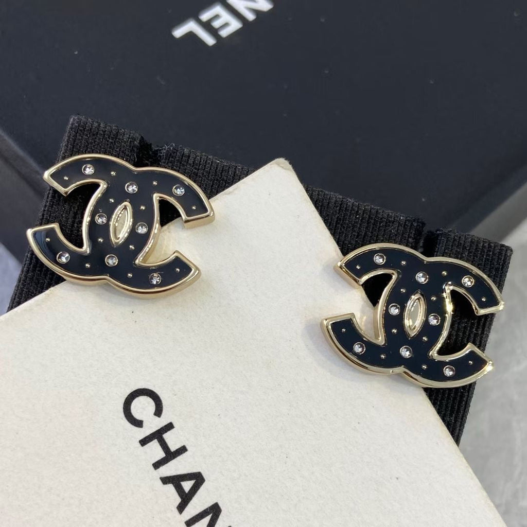 Chanel Black Star Earrings